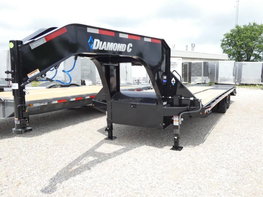 2025-diamond-c-fmax210-102-x-28-equipment-trailer-with-max-ramps-stock-1.jpg 2025 Diamond C FMAX210 102″x 28′ Equipment Trailer With MAX Ramps Stock# 300829 Gooseneck Trailers – Spencer Trailers - Image 1