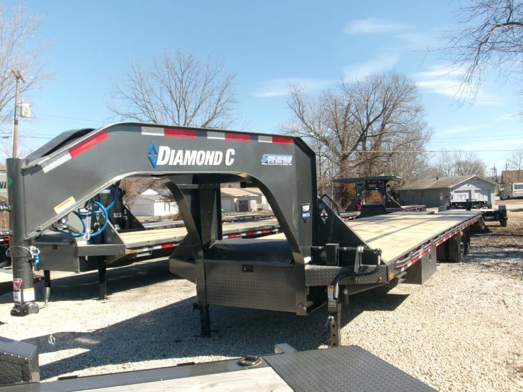 KODAK Digital Still Camera 2025 Diamond C FMAX210 102″x 35′ 25k Equipment Trailer With MAX Ramps Stock #297493 Goose Neck Trailer – Spencer Trailers - Image 1