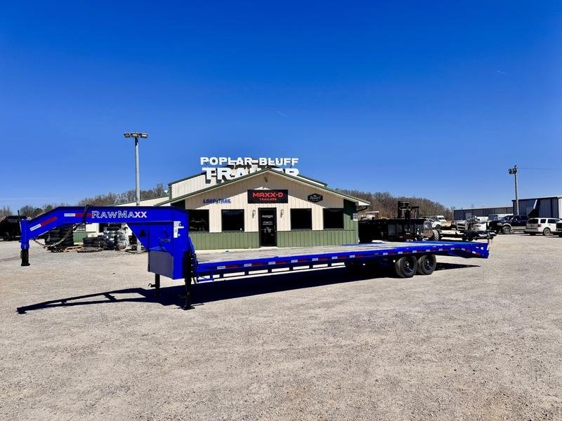 3B168A18-7FD9-49DD-9294-2B2F4CE68470.jpg 2024 RawMaxx *USED* 102″ x 34′ 12K Single Wheel Flatbed W/ Max Ramps - Image 1