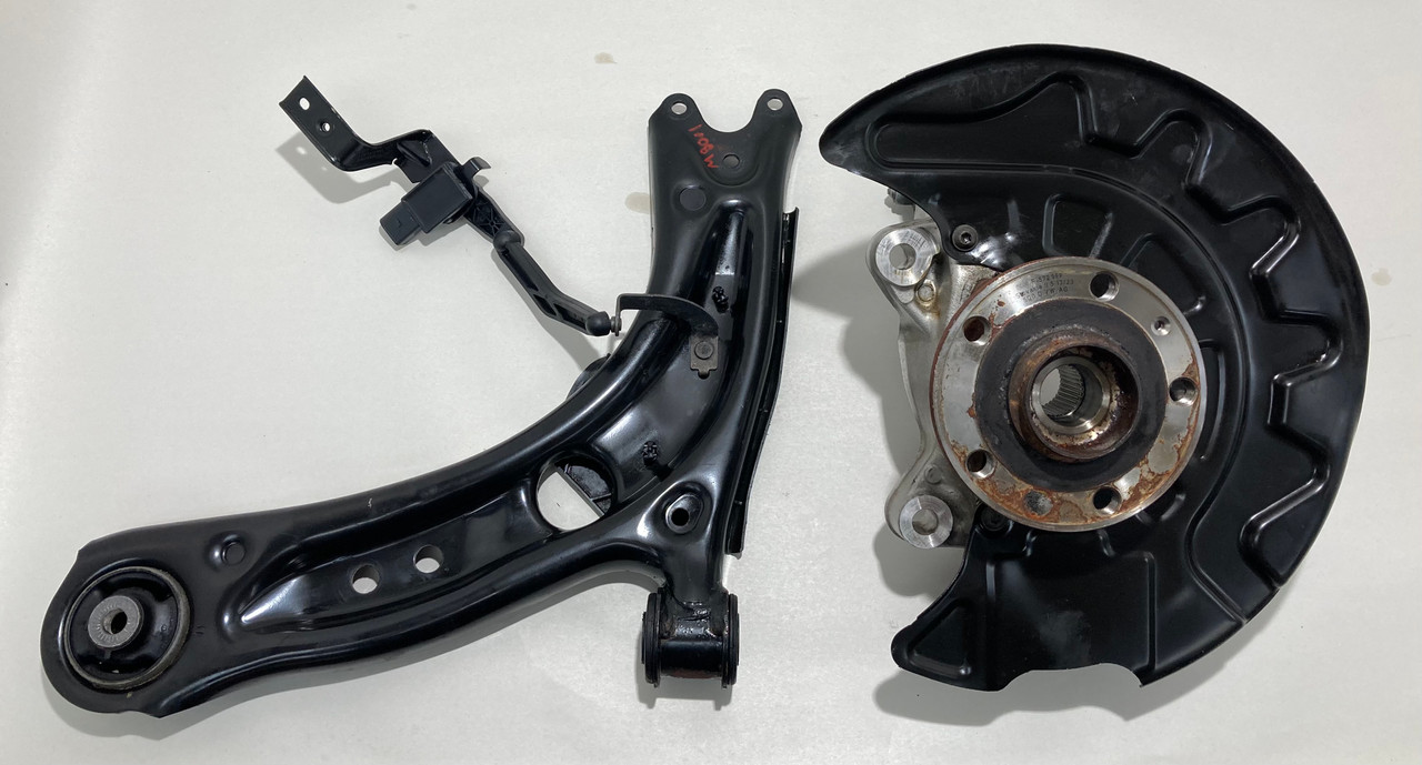 IMG_3800__87507.1747773603.jpg 2022-2024 Volkswagen MK8 GTI Driver Front Knee Hub w/ Control Arm / 25K M8001 - Image 1