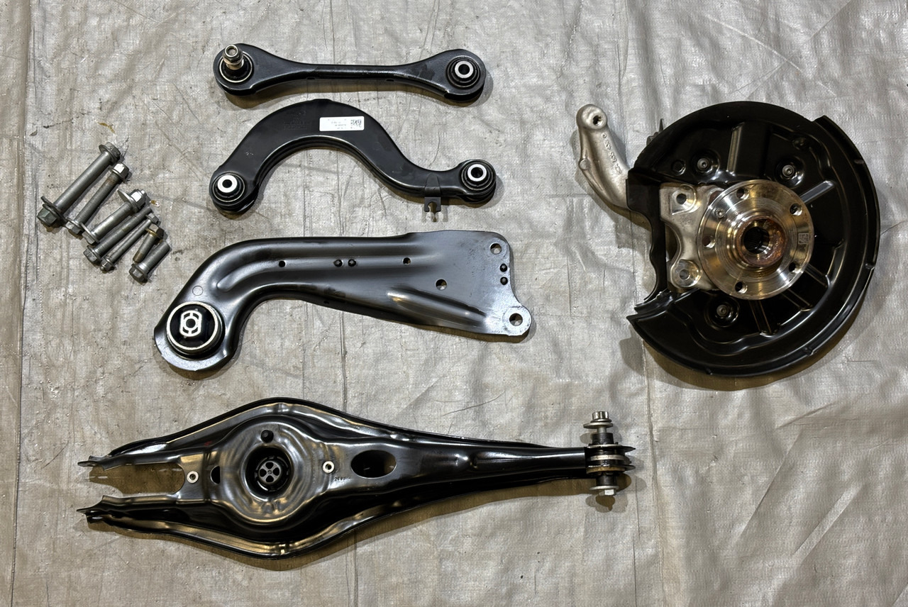 IMG_5566__00878.1782131454.jpg 2022-2025 Volkswagen MK8 Golf R Passenger Rear Knee / Hub w/ Control Arms / 19K M8R01 - Image 1
