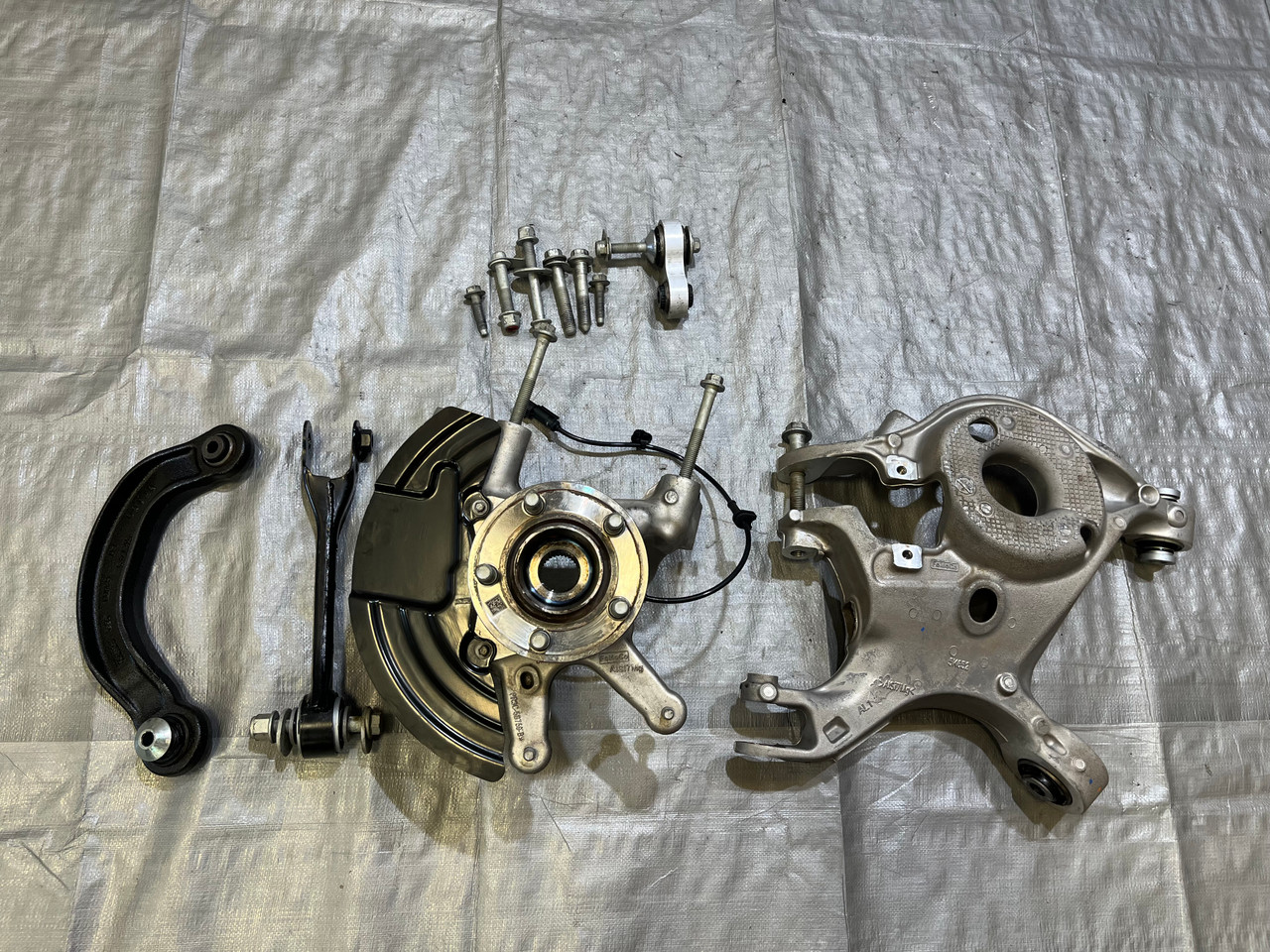 IMG_6247__80863.1773077852.jpg 2024-2025 Ford Mustang GT S650 Dark Horse Performance Driver Rear Knee Spindle Hub w/ Control Arms / 6k FM201 - Image 1